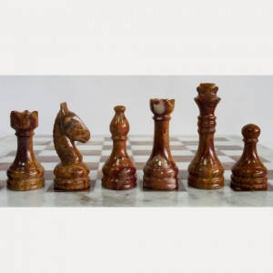 Шахматы из натурального камня Яшма и Мрамор, 40 х 40 см Каменные шахматы из полированного природного камня. Материал доски: яшма разных цветов. Материал фигур: яшма, мрамор разных цветов. Места для хранения каждой фигуры. 