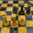 Шахматы из натурального камня Черный Оникс и Яшма, 40 х 40 см